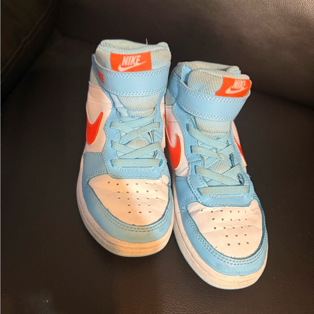 Nike Kids' Sky Blue and White Sneakers with Orange Swoosh